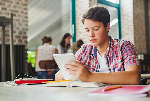 A boy studying with a language app